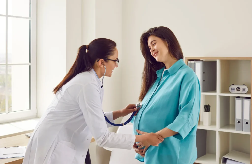 A doctor and a pregnant woman